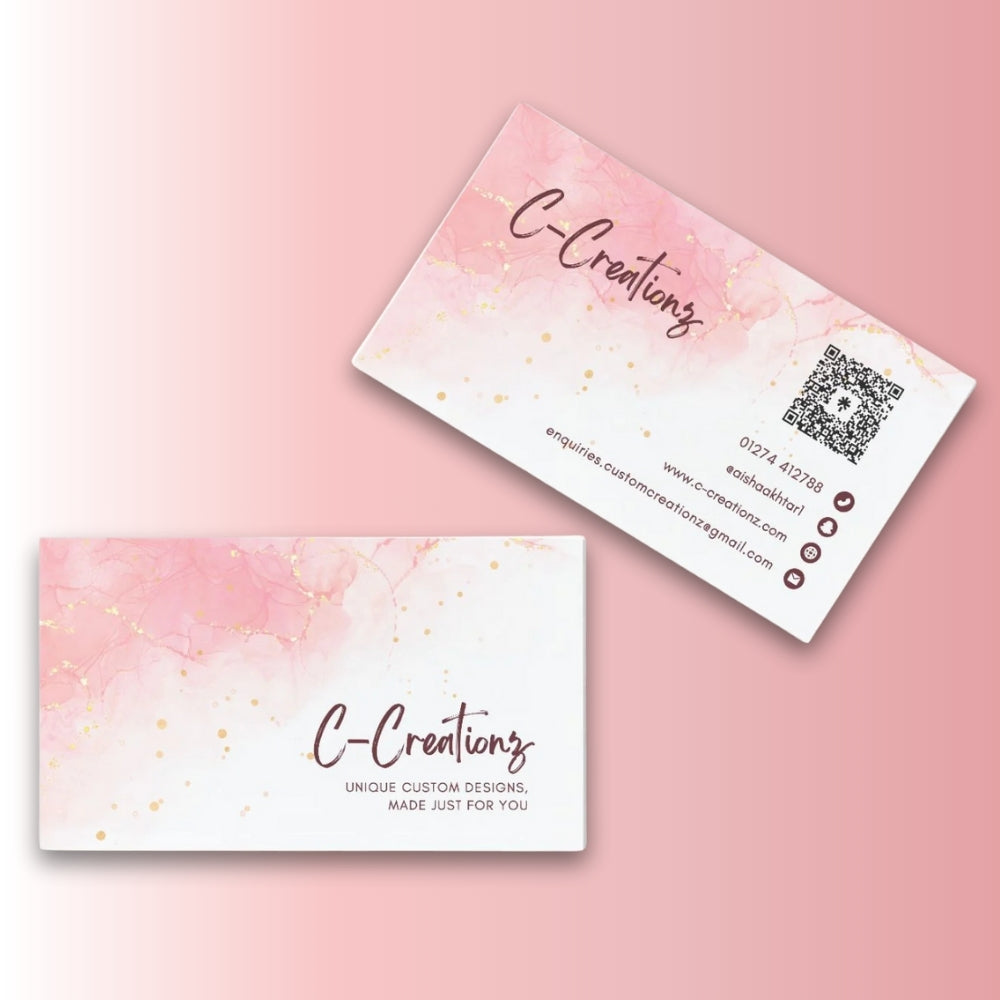 Two business cards with 'C-Creationz' branding on a pink background