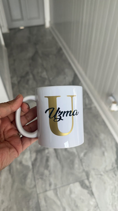 Personalised mug- Gold letter with name in a black colour.