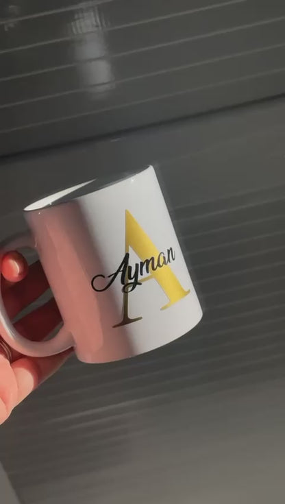 Personalised mug- Gold letter with name in a black colour.