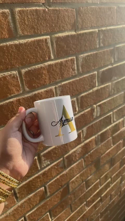 Personalised mug- Gold letter with name in a black colour.